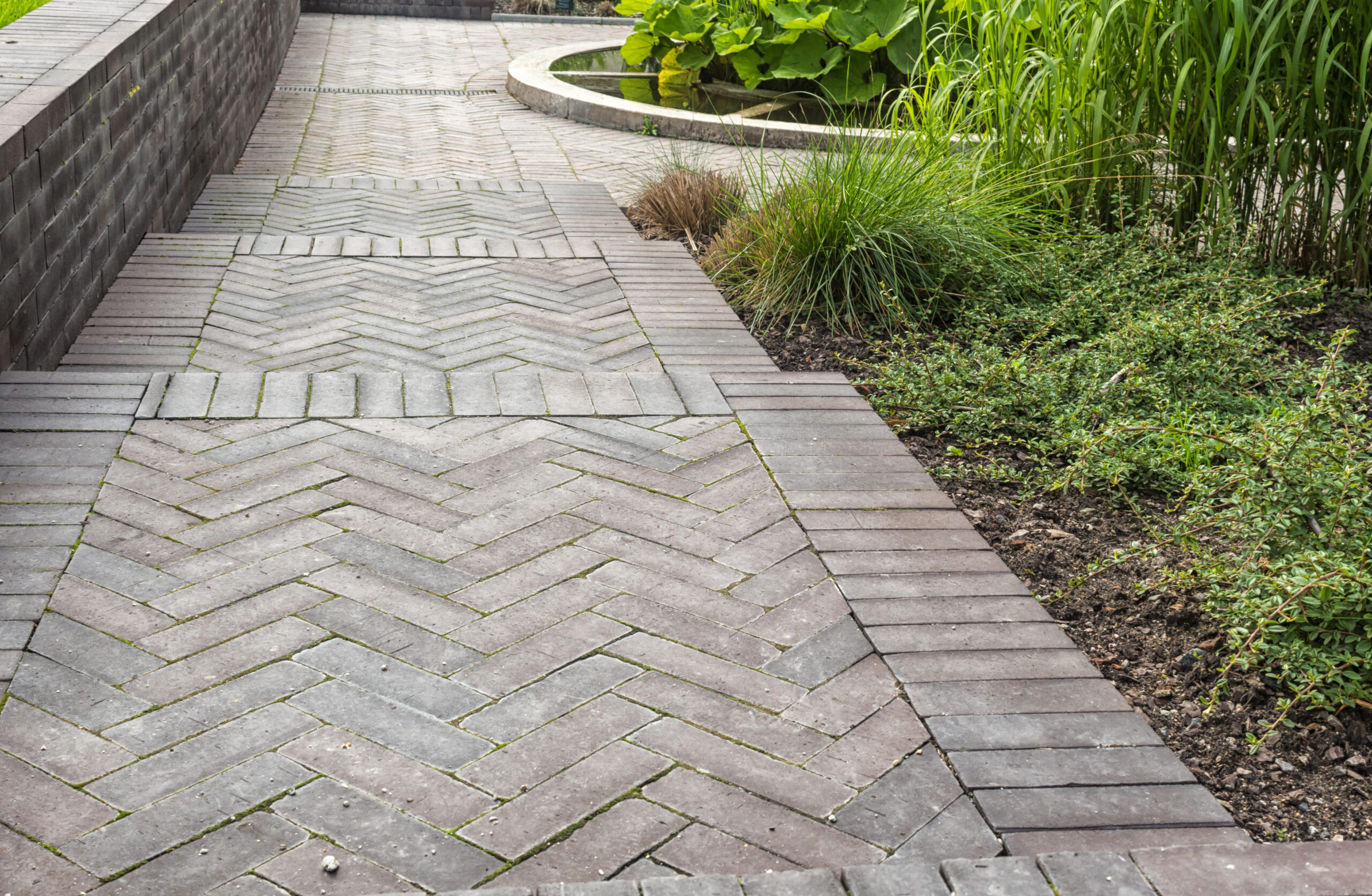 Artisan stone masonry showing precision joints and texture